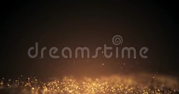 黄金粒子移动背景从下面的粒子颗粒金尘闪在黑色背景上视频的预览图