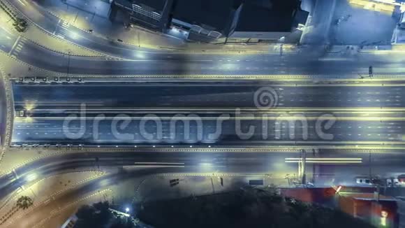 泰国曼谷4路站街交叉口环形交叉路口夜间城市交通时间4架UHD水平空中飞机视频的预览图
