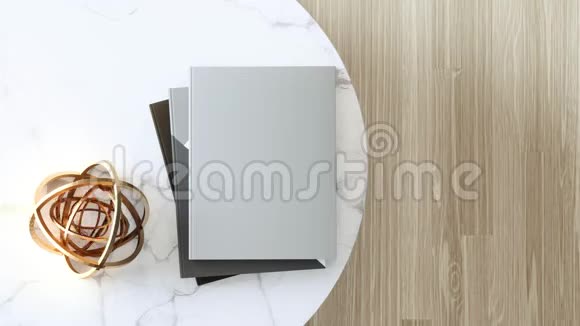 空白大理石桌上空白封面书或杂志视频的预览图