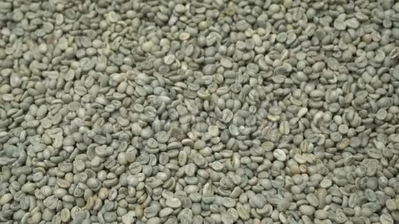 青豆阿拉伯咖啡特写生产有机咖啡的过程一堆咖啡豆咖啡是视频的预览图