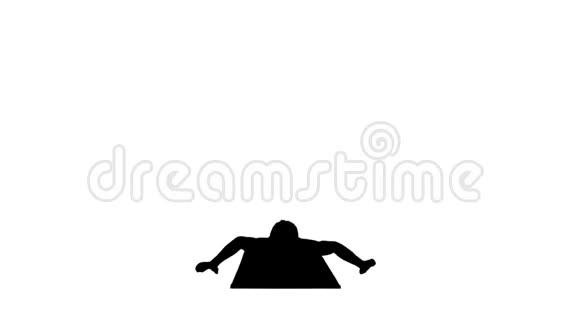 剪影无衫运动男子展示瑜伽弓姿势在垫子上视频的预览图