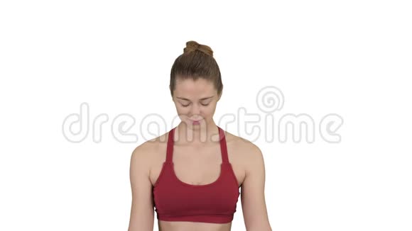 瑜伽微笑的女人双手结合在白色的背景上视频的预览图