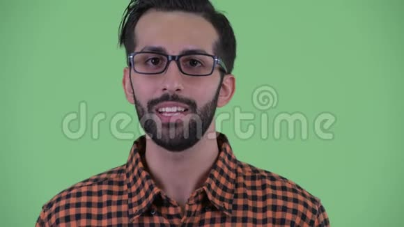 一张快乐年轻留胡子的波斯时髦男人的脸视频的预览图