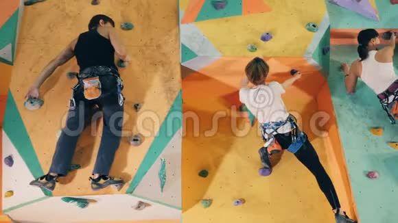 两个男人和两个女人在爬人造墙视频的预览图