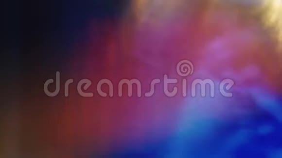 橙色的光在蓝色的背景上闪烁迷幻抽象色彩视频的预览图