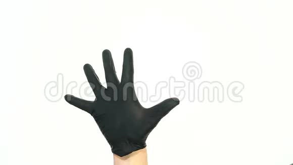 一个男人的动作他的手戴着一只黑色橡胶手套纹身视频的预览图