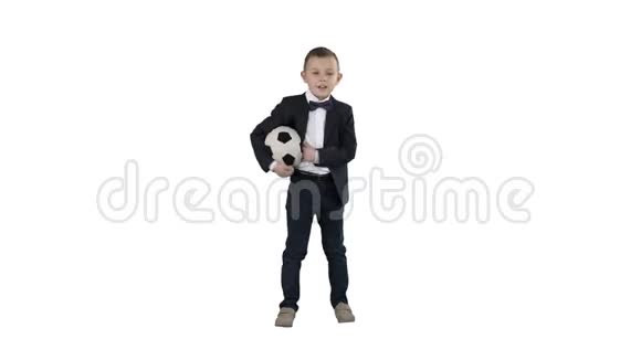 快乐的小男孩拿着一个白色背景的足球视频的预览图