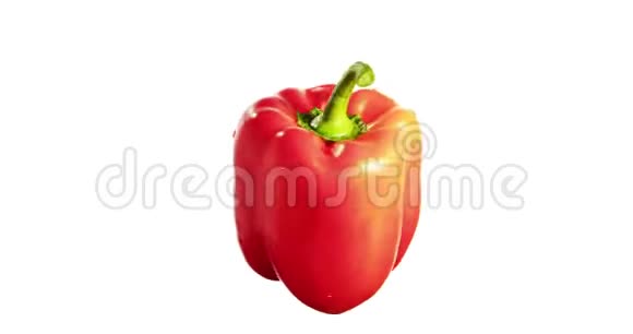 铃红甜椒旋转分离在白色背景食品上悬浮在空气中视频的预览图