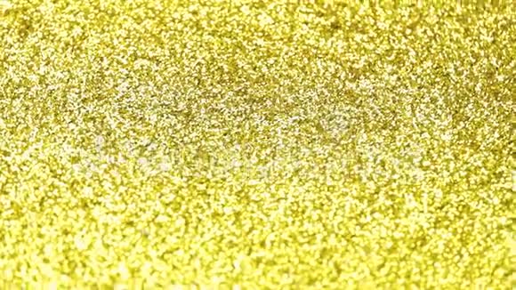 闪耀的金色闪光纹理背景视频的预览图