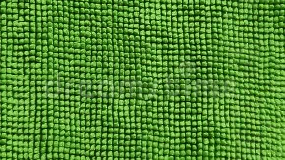 绿色纺织毛巾风背景高清镜头视频的预览图