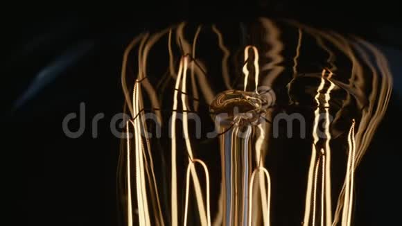 闪烁的茎和燃烧爱迪生灯泡的连线视频的预览图