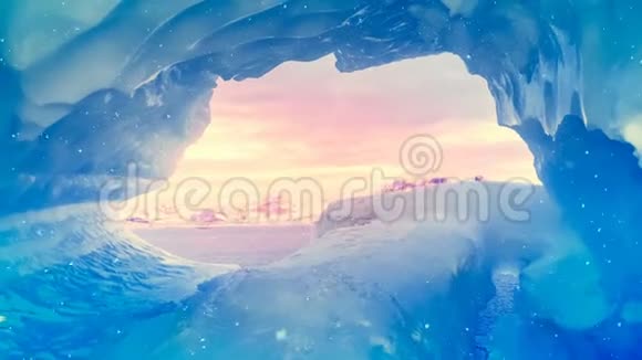 蓝色冰冻的南极洞穴图片橙色的天空视频的预览图