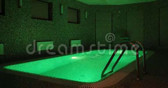 有绿色照明的豪宅内的室内游泳池视频的预览图