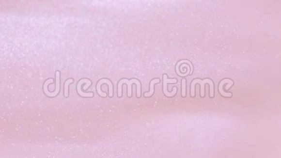 闪闪发光的波浪闪亮的粉红色液体抽象地脉动视频的预览图