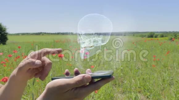 智能手机上的人类头骨全息图视频的预览图
