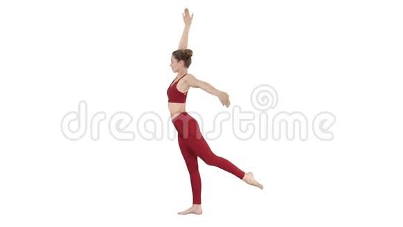 瑜伽姿势女人做伸展腿腿在白色背景上分裂视频的预览图