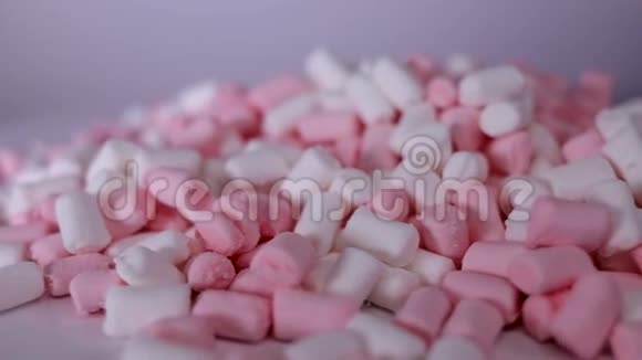 浅粉白色糖果旋转背景视频的预览图