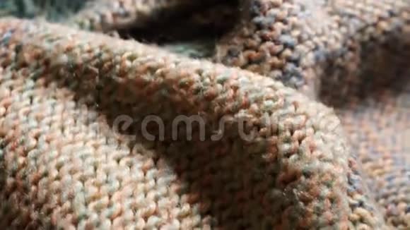 保暖针织毛衣的时尚背景面料的特写柔和的颜色视频的预览图
