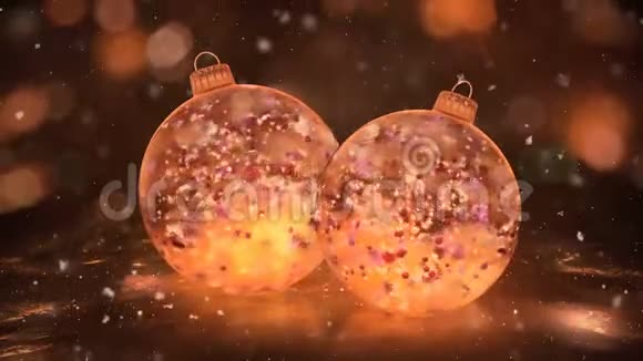 两个旋转的圣诞金冰宝贝雪多彩花瓣背景循环视频的预览图