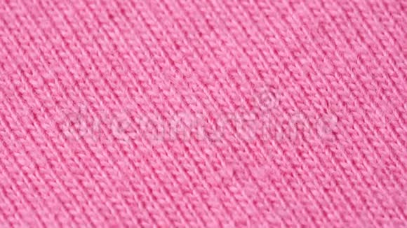 纺织背景粉红色100棉布与运动衫支架结构视频的预览图