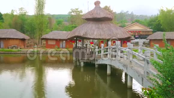 泰国三铁川中国云南文化村的池塘视频的预览图