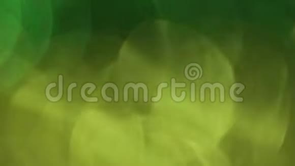 多色离焦背景绿色和黄色4K视频的预览图