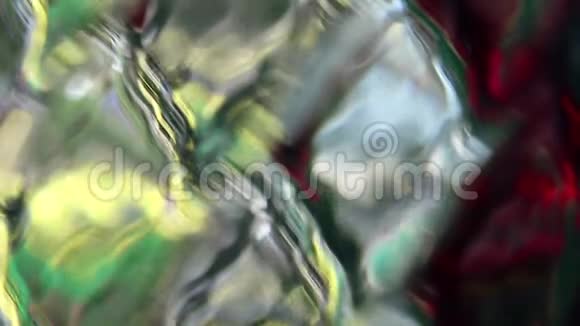 菱形花纹玻璃表面抽象颜色反射视频的预览图
