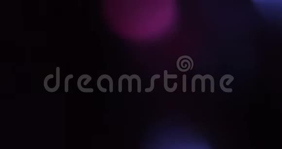 紫色紫色抽象气泡颗粒在黑色背景上晃动喜庆新年视频的预览图