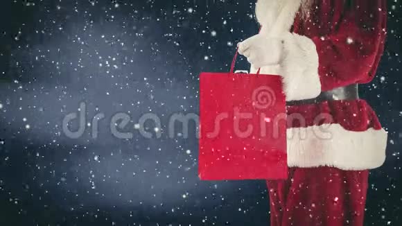 圣诞老人条款手里拿着购物袋还有降雪视频的预览图
