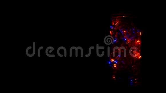 玻璃罐有新年闪闪发光的多色灯光2019年圣诞节复印空间装饰圣诞节视频的预览图