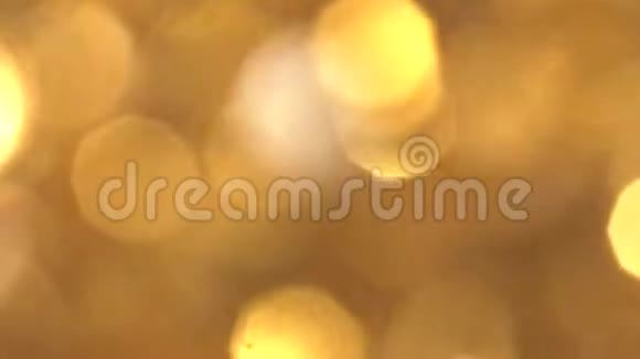 摘要黄金波克灯在运动中的4k视频高质量的金粒子渲染最适合圣诞节情人节视频的预览图