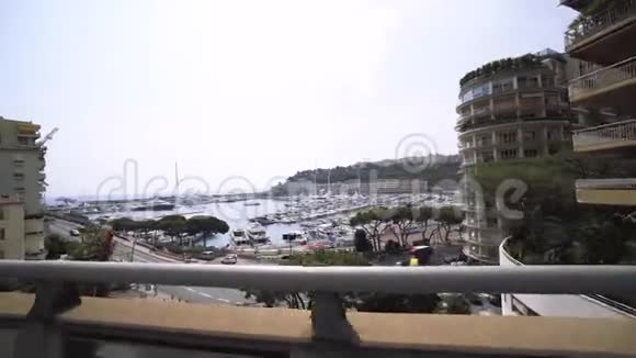 摩纳哥城市港口游艇蒙特卡洛晴天4K射击视频的预览图