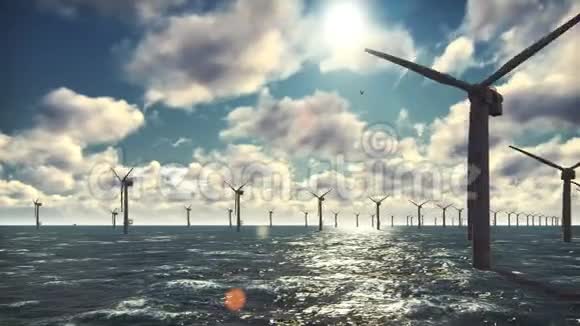海上风车农场在海洋中风车在美丽的阳光明媚的晴天与蓝色隔离在海洋中视频的预览图