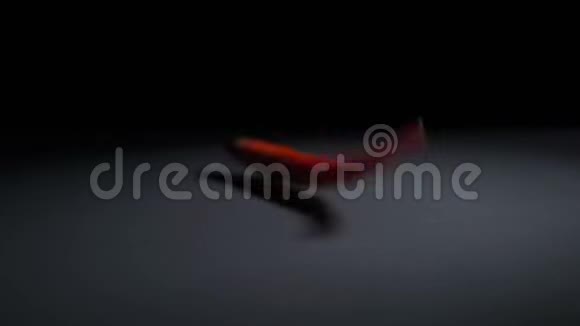 黑色背景下的鲜生红辣椒视频的预览图