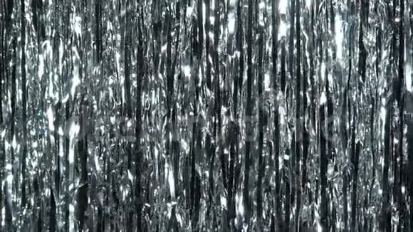 银丝雨闪光和闪烁粒子中的动态背景视频的预览图