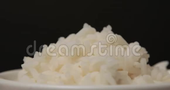 旋转一碗熟米蒸视频的预览图
