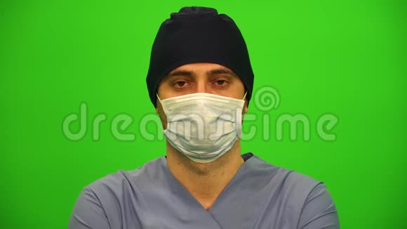 外科医生或带面具医生的特写镜头视频的预览图