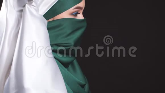 全国时装摄影摄像中的年轻伊斯兰妇女特写视频的预览图