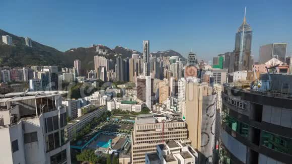 香港2018年5月白天到晚上天台时间从上面看湾仔市区视频的预览图