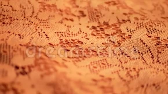 橙色织物纺织纹理为背景视频的预览图