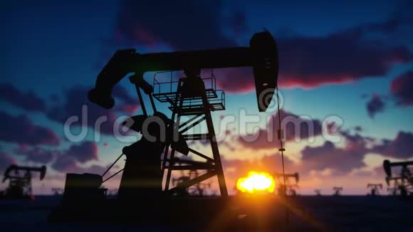 日出时用千斤顶工业石油机水泵千斤顶在红天上抽油的剪影视频的预览图