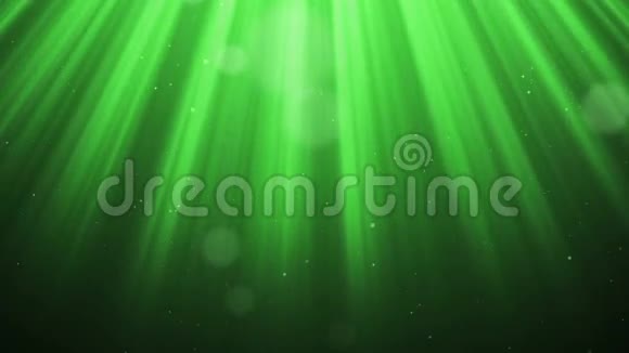 节日体积光线与闪光粒子波克环动画抽象CG运动绿色背景视频的预览图