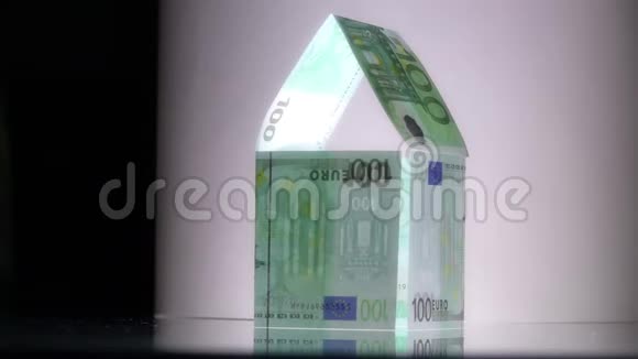 用欧元纸币制成的破败房屋的慢镜头抵押或建筑问题概念视频的预览图