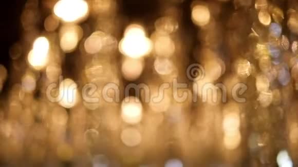 金色抽象bokeh灯离焦背景博克灯视频的预览图