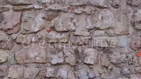 古老的石墙古老的石墙纹理石工图案背景视频的预览图