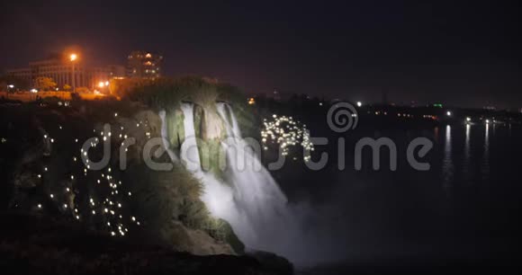 土耳其安塔利亚的杜登瀑布周围有神奇的灯光旅行目的地视频的预览图