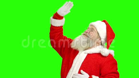 圣诞老人挥舞着他的手色度视频的预览图