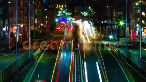 东京市中心街道的时间推移夜间长时间曝光中镜头变焦视频的预览图