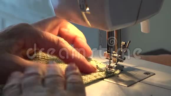 缝纫机纺织业宏观领域女工工作细节视频的预览图
