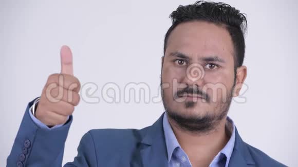 一张满脸胡须的印度商人竖起大拇指视频的预览图